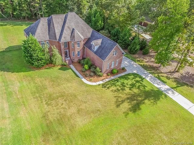 Welcome Home to Your Country Estate on 1.2+ Acres 