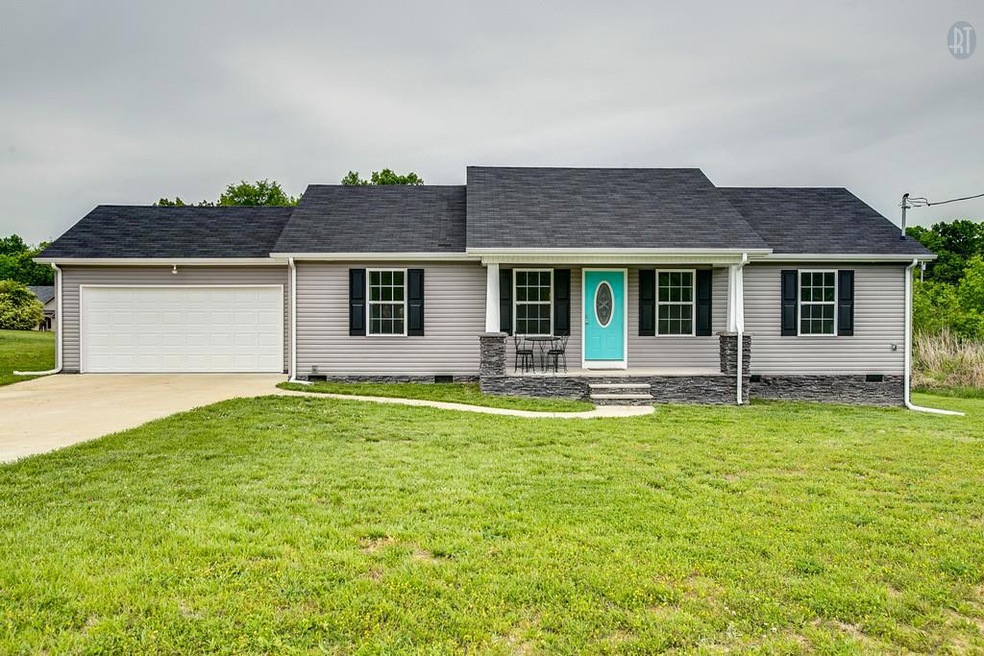 PERFECT STARTER HOME WITH OPEN FLOOR PLAN & ZONED BEDROOMS