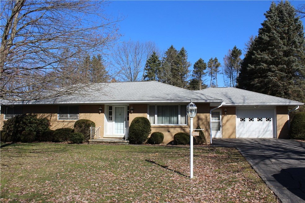 Front of this 3 bedroom 2 bath brick ranch home