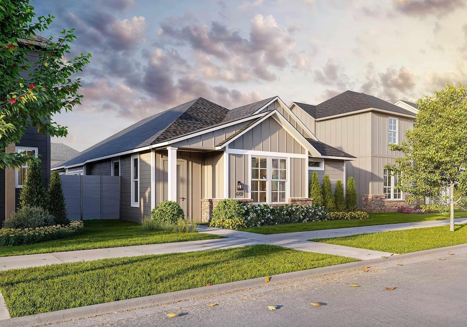 View of front of home featuring a shingled roof, b