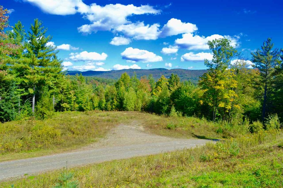 This view shows the driveway, flat building site m