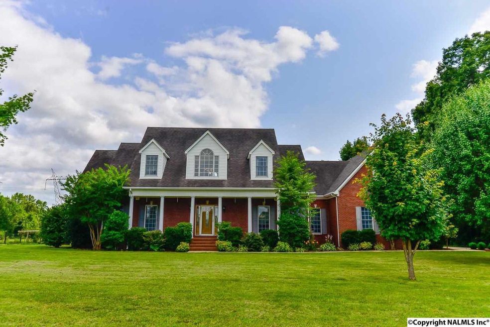 This all brick home has great curb appeal.