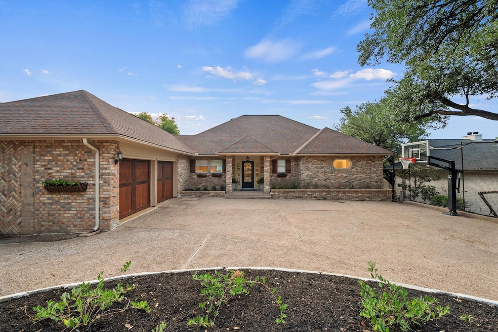 View of front of property with brick siding, an a