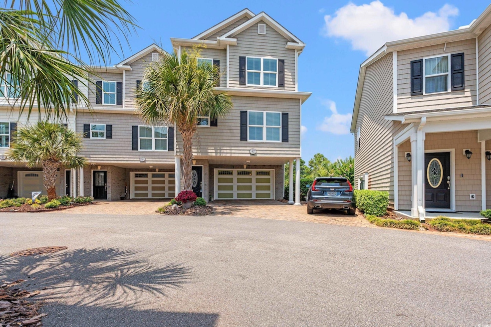 Multi unit property with driveway and an attached garage