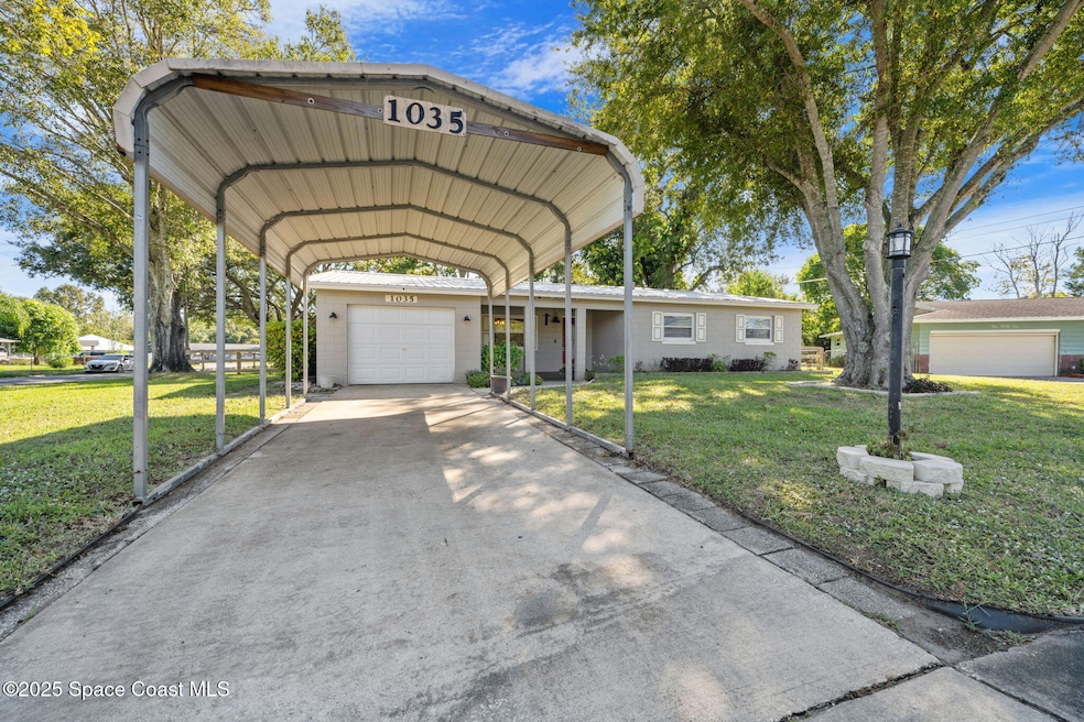 1035 S Mars Ct, Titusville, FL 32796 - photo 1