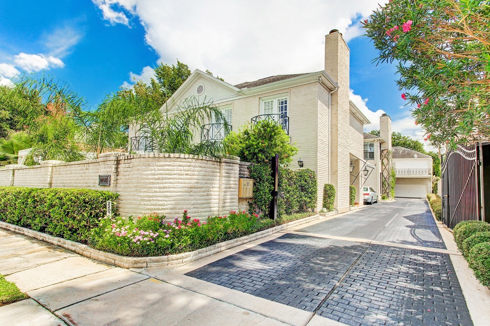 At the end of a brick paver driveway is an elegant, well-built, beautifully maintained patio home that has been in the same family for 35 years.