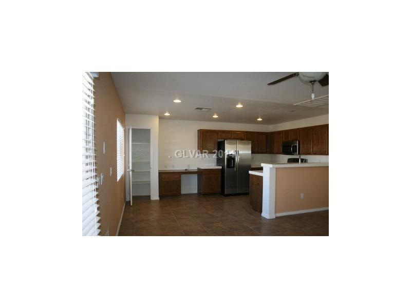 Property Photo. Kitchen and Dining Area