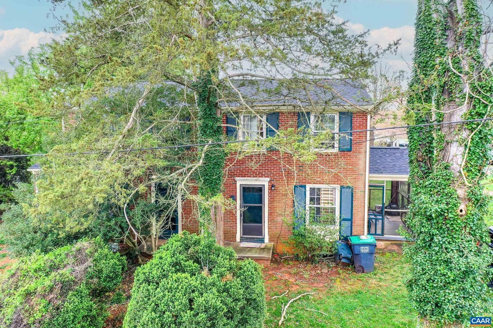 Great income generating brick home with side by si