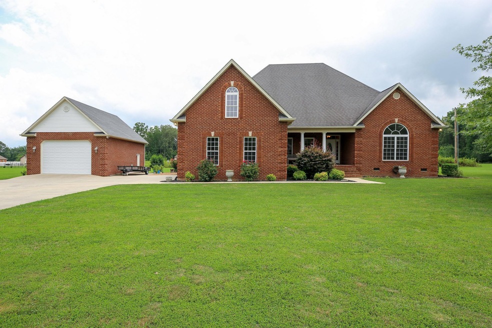 Gorgeous 3 BR/2 bath brick home w/detached garage & 1.04 acre lot!