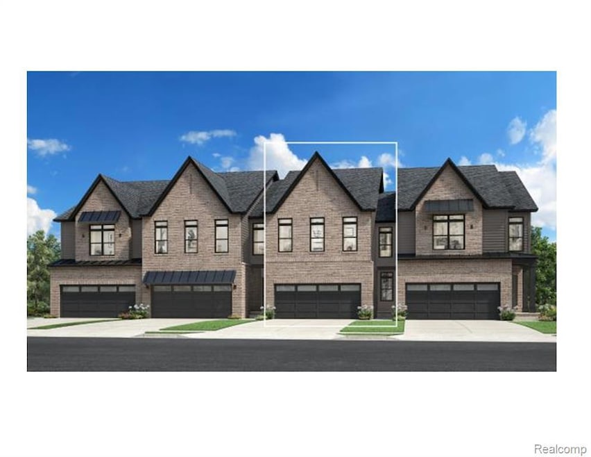 View of front facade featuring an attached garage with unfinished basement