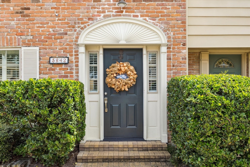 Welcome to the charming townhome at 5842 Doliver.
