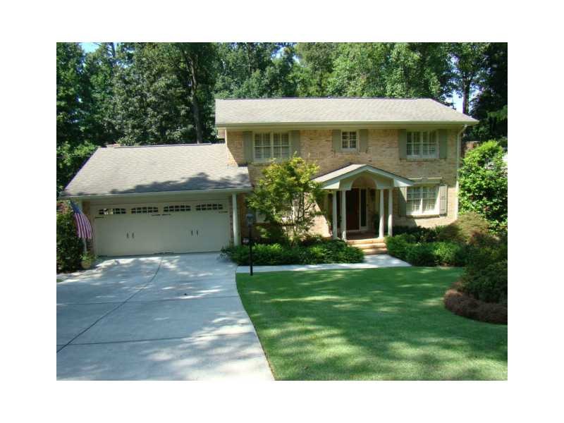 Exterior Front. Beautiful all brick home covered e