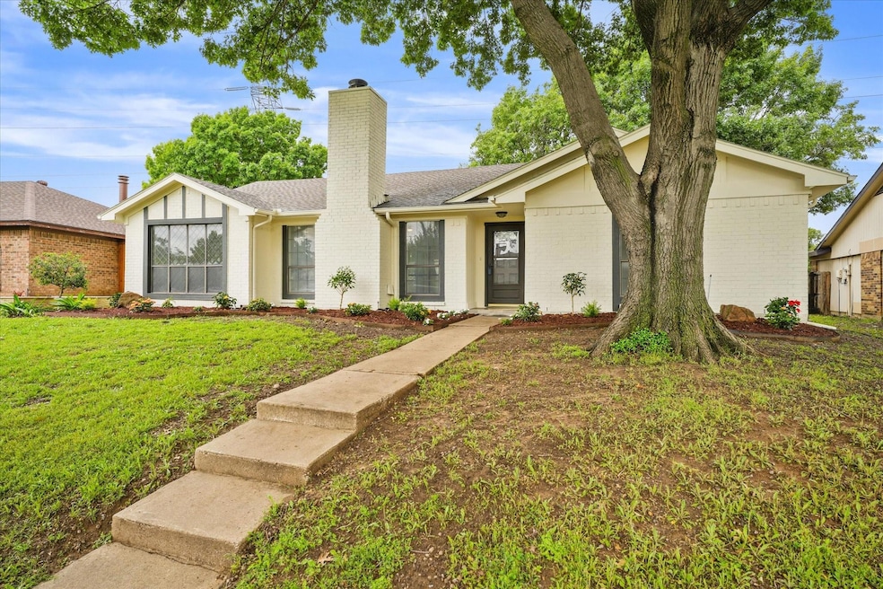 Single story home featuring a front yard