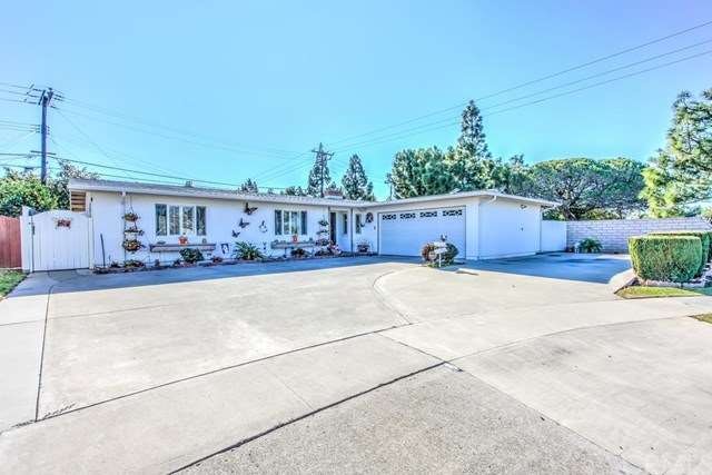 Curbside view of this charming ranch style home on