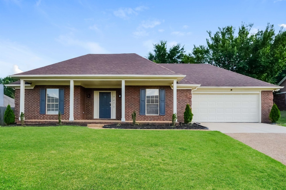 Ranch-style house featuring driveway, a front yard, an attached garage, brick siding, and a shingled roof