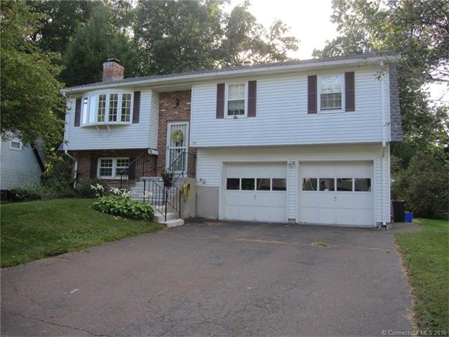 Lovely curb appeal and pretty flowers create a wel