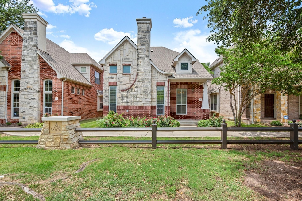 View of front facade with a chimney, a shingled r