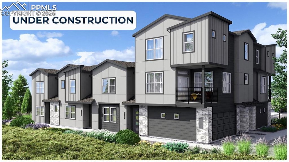 View of front facade featuring board and batten siding, a balcony, stone siding, roof with shingles, and a garage