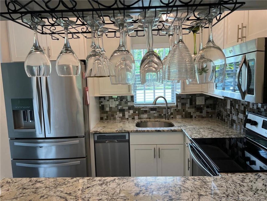 from the breakfast bar to the sink -