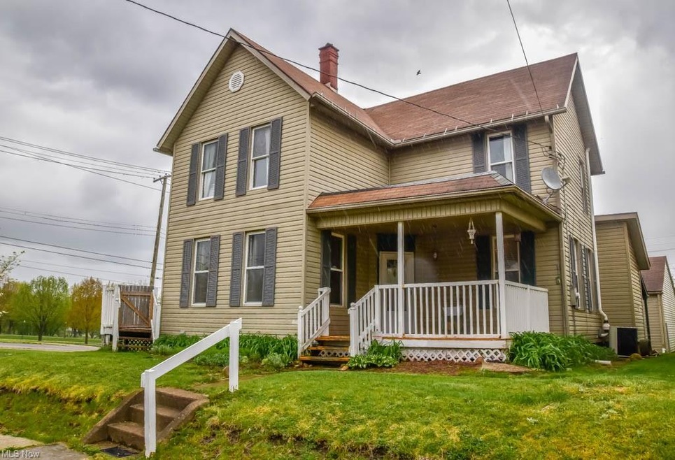 Charming 4 bedroom century home on a large corner lot with a 2-car detached garage!