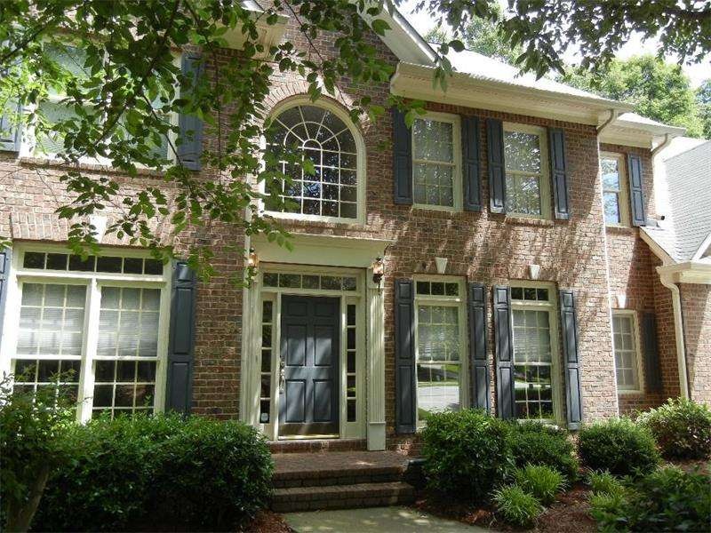 Brick 4 bedroom home w two car garage