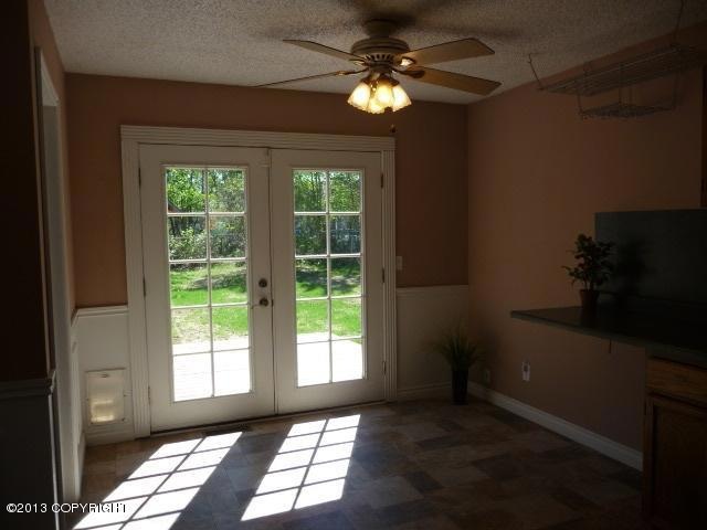 French Doors to Large Fenced Back Yard