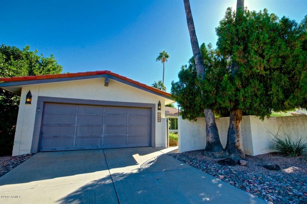 Front shot showing 2 car garage