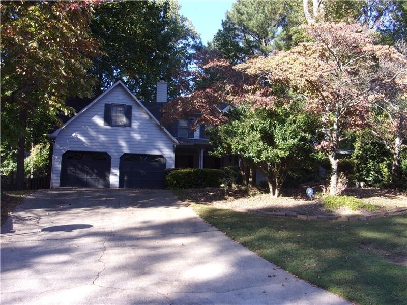 Front of home on shaded lot