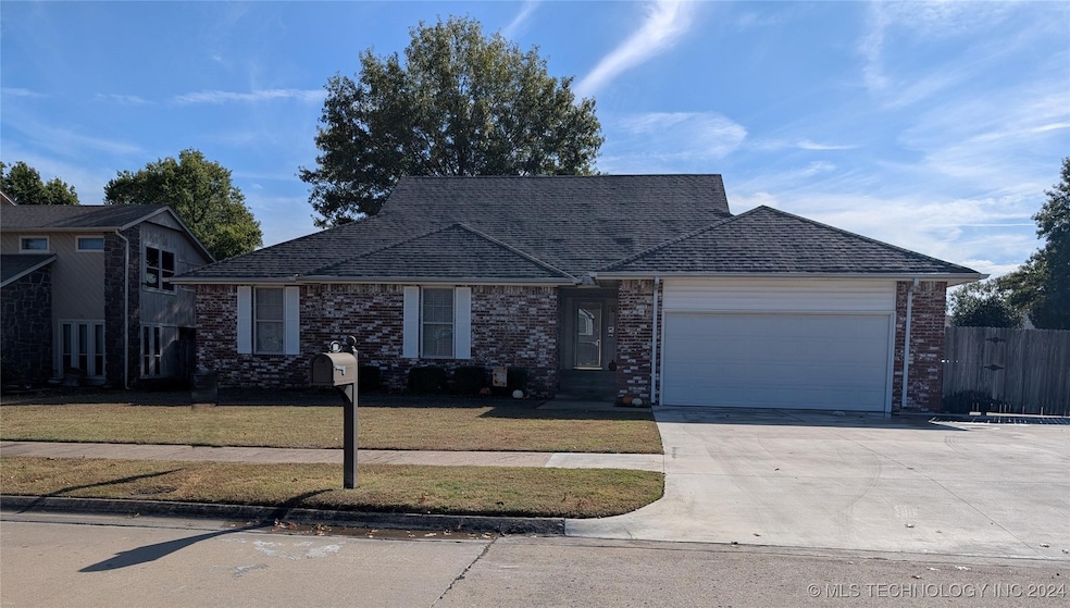 New Roof! One story, full brick, expansive 3 car d