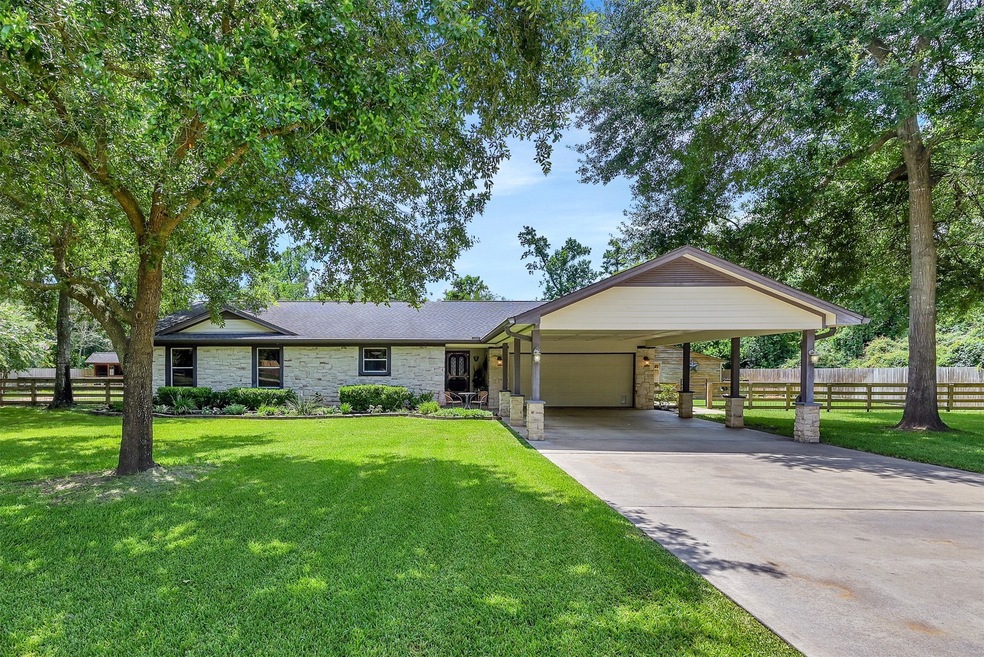 142 Sentinel Oaks, Pinehurst, TX 77362 - photo 1