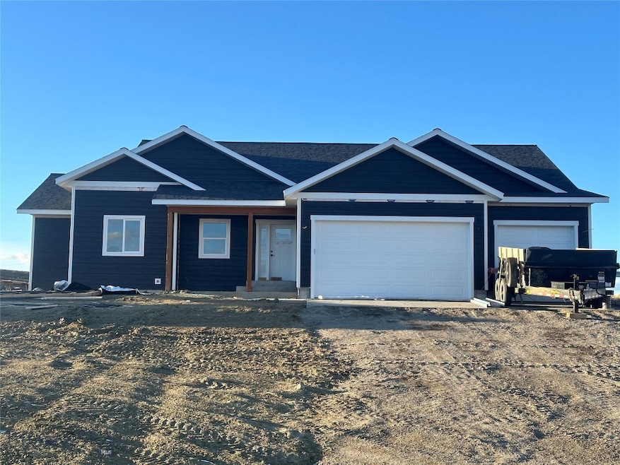 View of front of home with 3 car garage