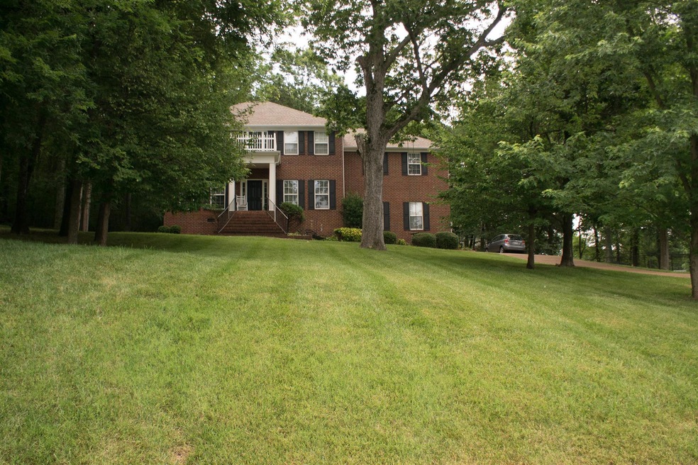 Incredible Hillside Home Great Valley Views from Front Facing Rooms.  Woods & Privacy with covered Patio in back of the house. 