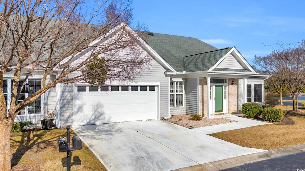 Front of property with a garage