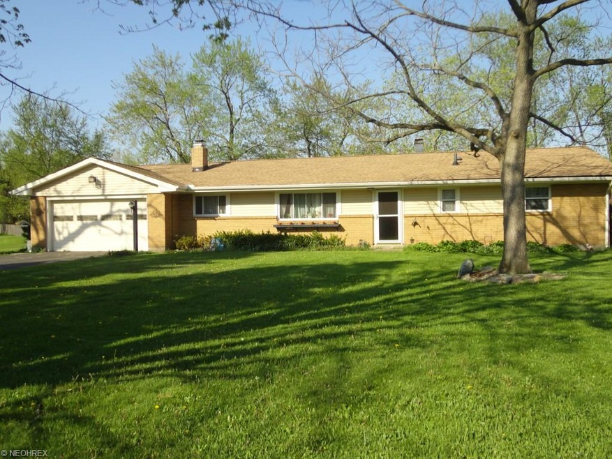 Welcome home to 9047 Cherokee Run in Macedonia.  3