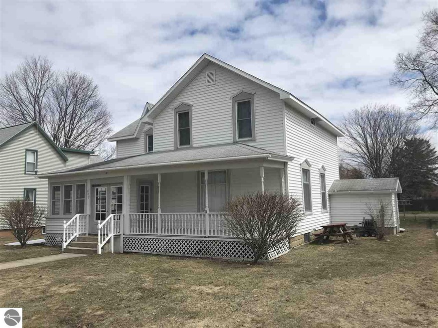 407 Pine St, Elk Rapids, MI 49629 - photo 1