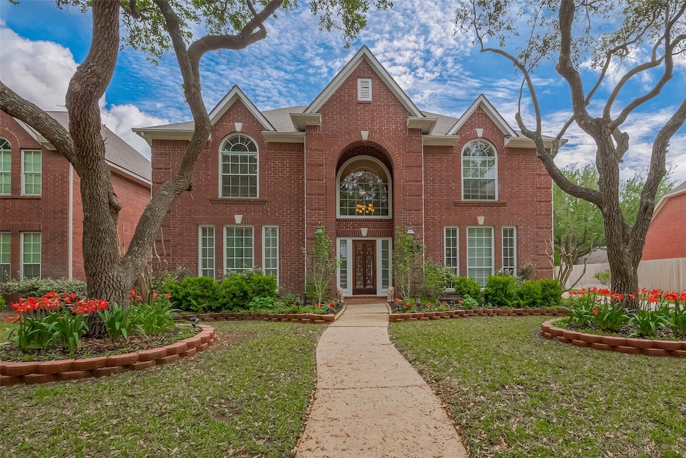 4218 Magnolia Lane, be greeted by a freshly landsc