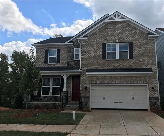 Brick and Stone Exterior with James Hardie Board C