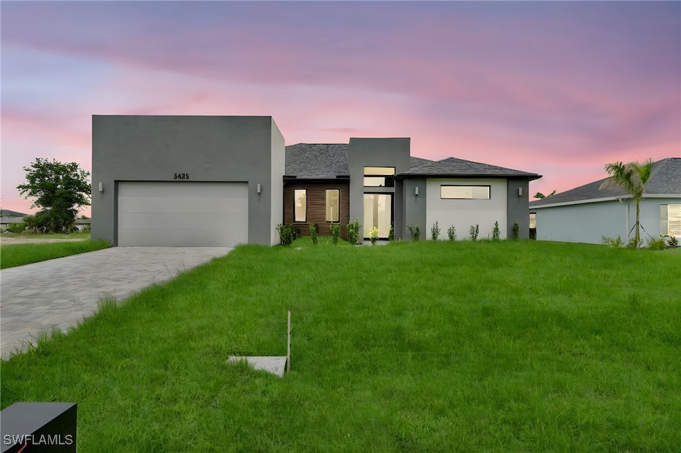 Contemporary home with stucco siding, decorative d