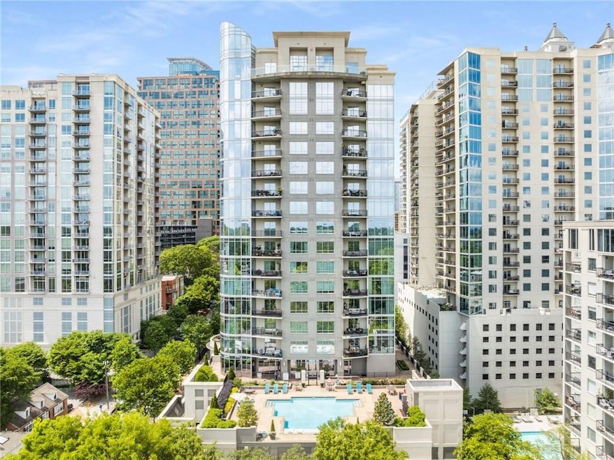 View of building exterior featuring a city view