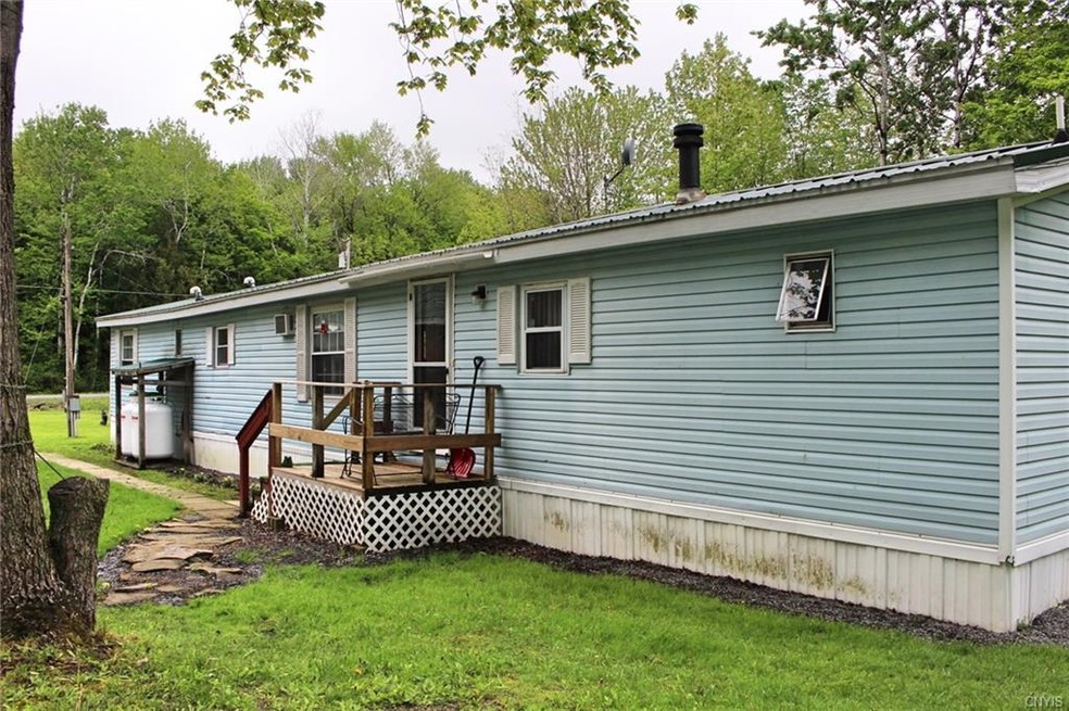 Mobile Home with 7 acres of land!!!