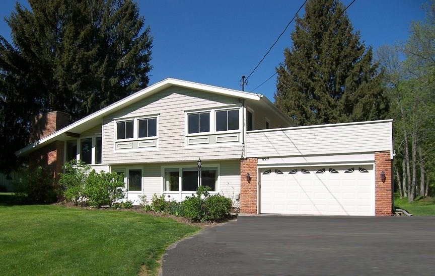 Wow!  Gorgeous contemporary on wooded 1.8 acre lot