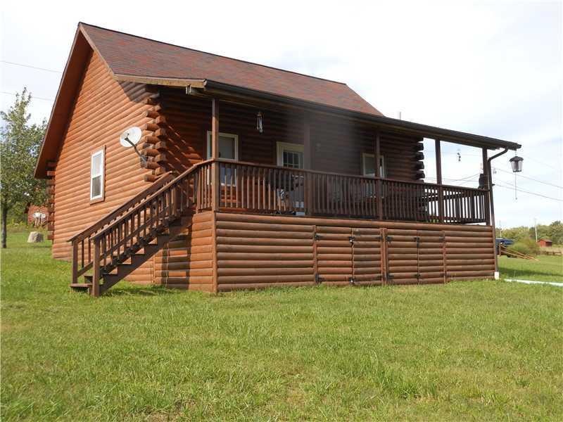 Exterior Front. Authentic Amish Built Log Cabin