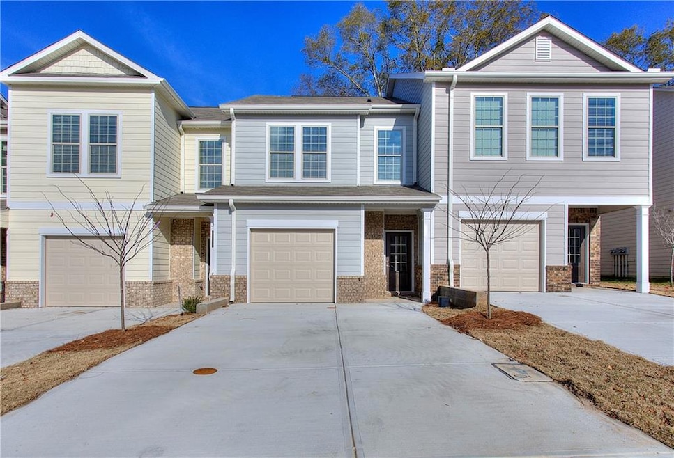 View of front of home featuring a garage