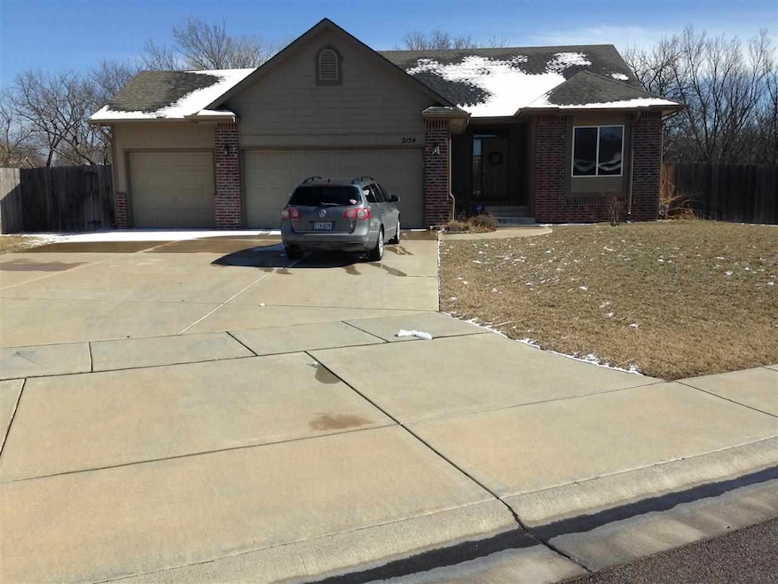 Great curb appeal with lots of parking