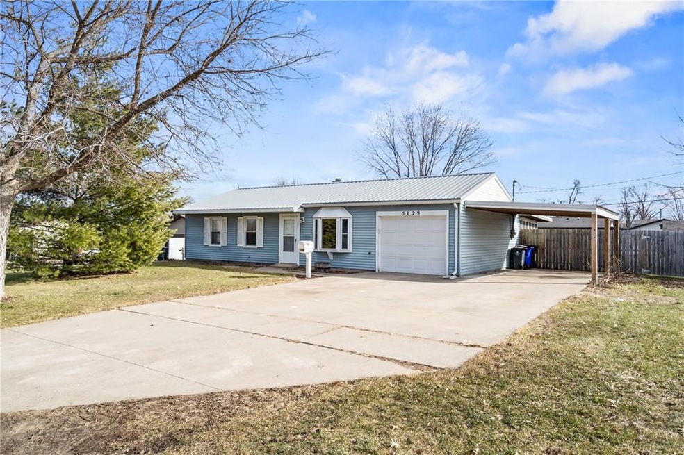 Front view with carport.