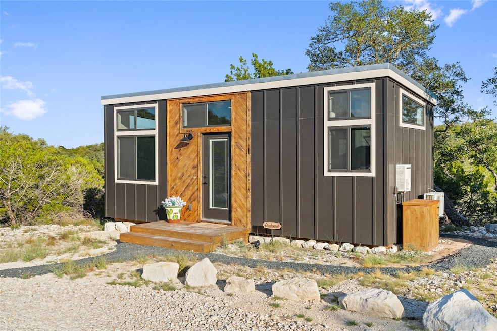 Contemporary home featuring board and batten sidi