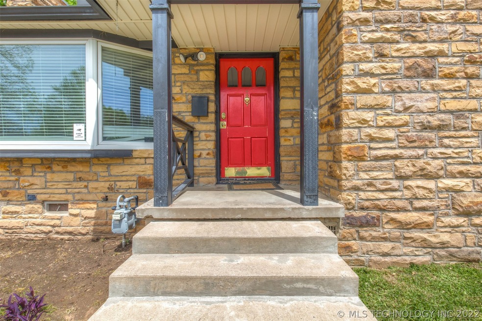 Inviting front entryway showcasing a big bay windo