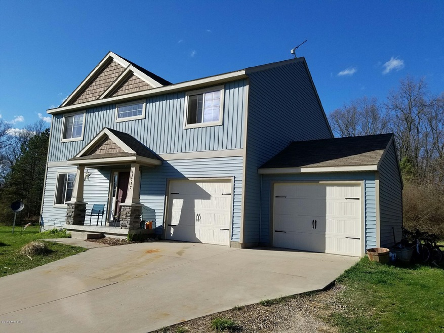 12777 Triple Oak Dr NE, Lowell, MI 49331 - photo 1