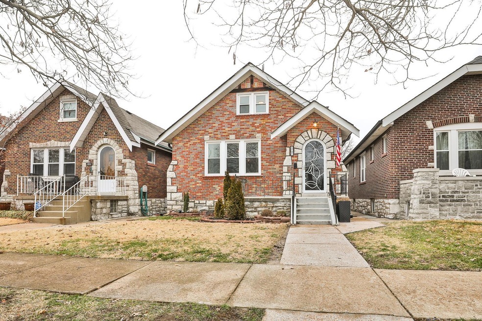 Stunning 3Bed/2Bath 1.5 Story brick home located w