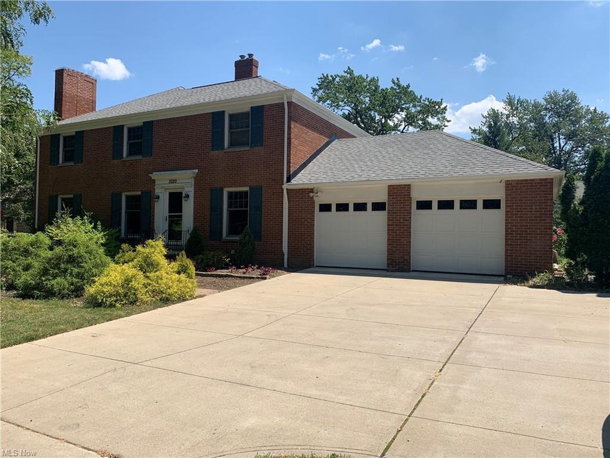Front entrance to first level owners unit and outside parking